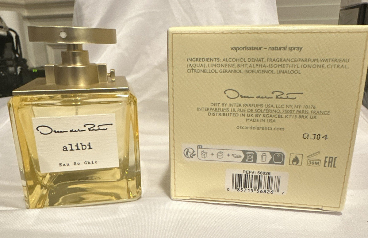 Oscar de la Renta Alibi Eau So Chic EDT bottle beside box