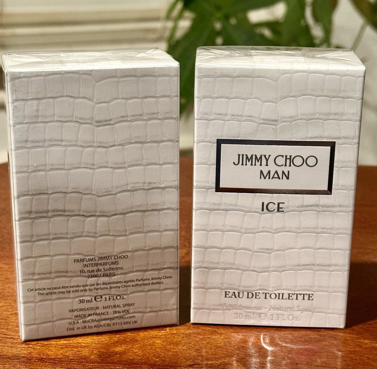 Jimmy Choo Man Ice EDT bottle and box on wood
