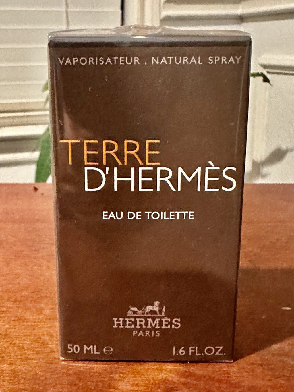 Hermès Terre d'Hermès men's Eau de Toilette 50 ml bottle with orange and earth-toned packaging visible.