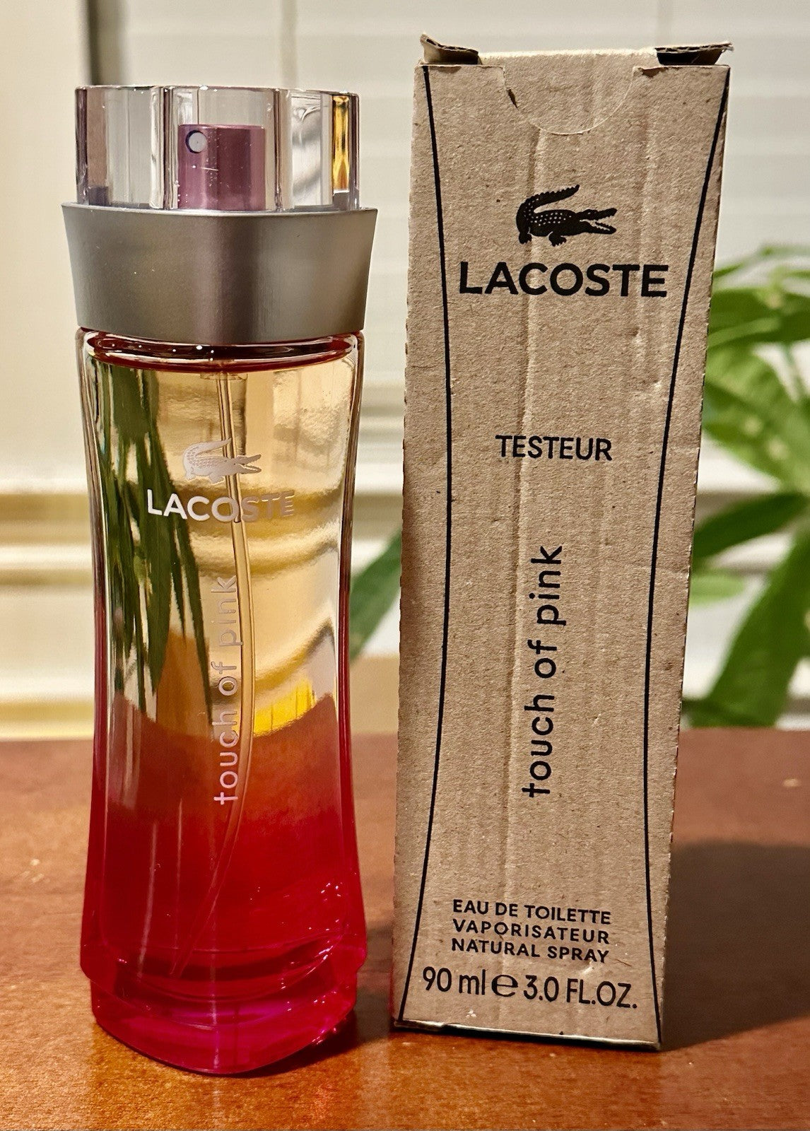 Lacoste Touch of Pink bottle and box