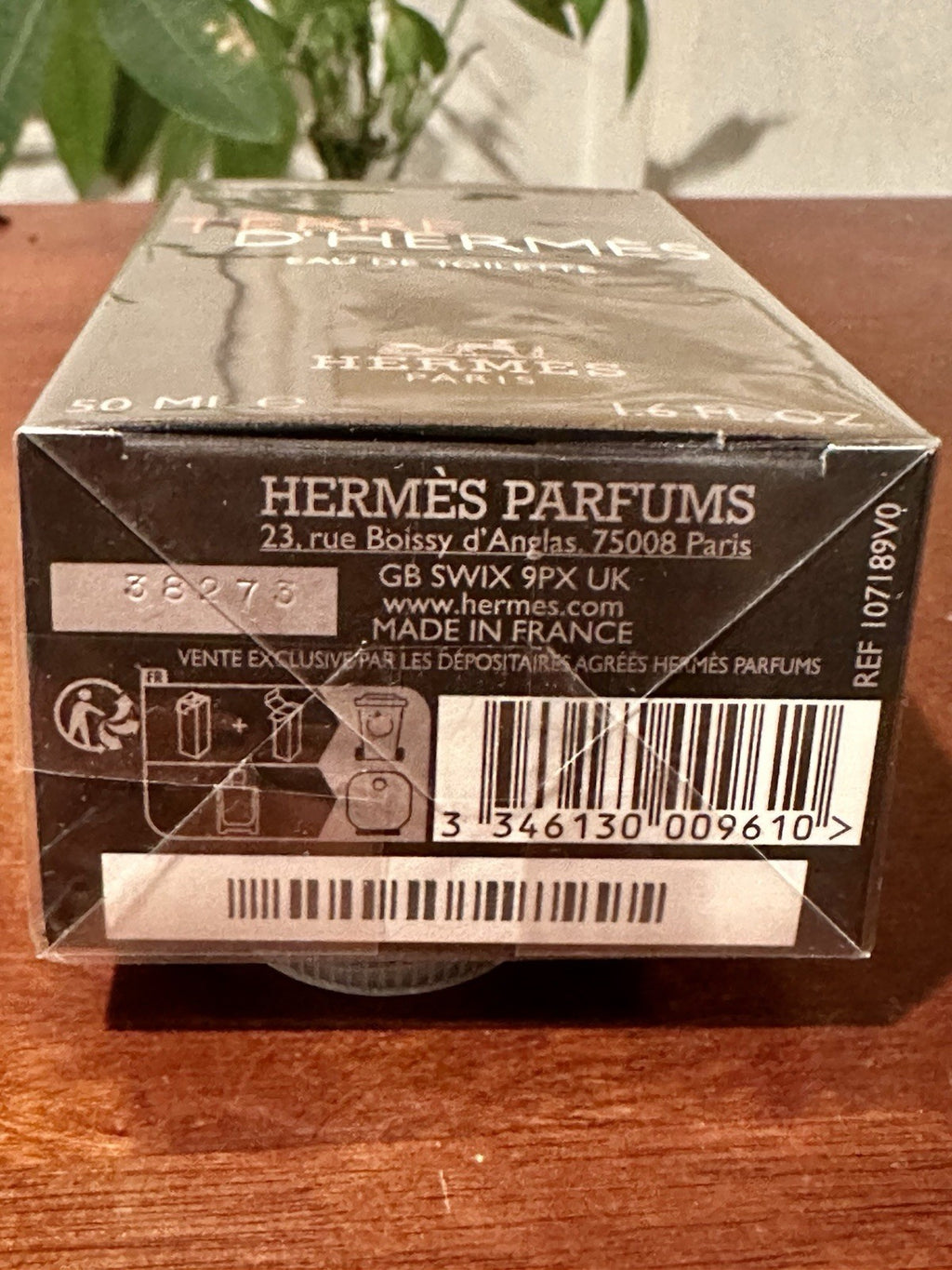 Hermès Terre d'Hermès men's Eau de Toilette 50 ml bottle with minimalist orange and black packaging, showcasing the fragrance.