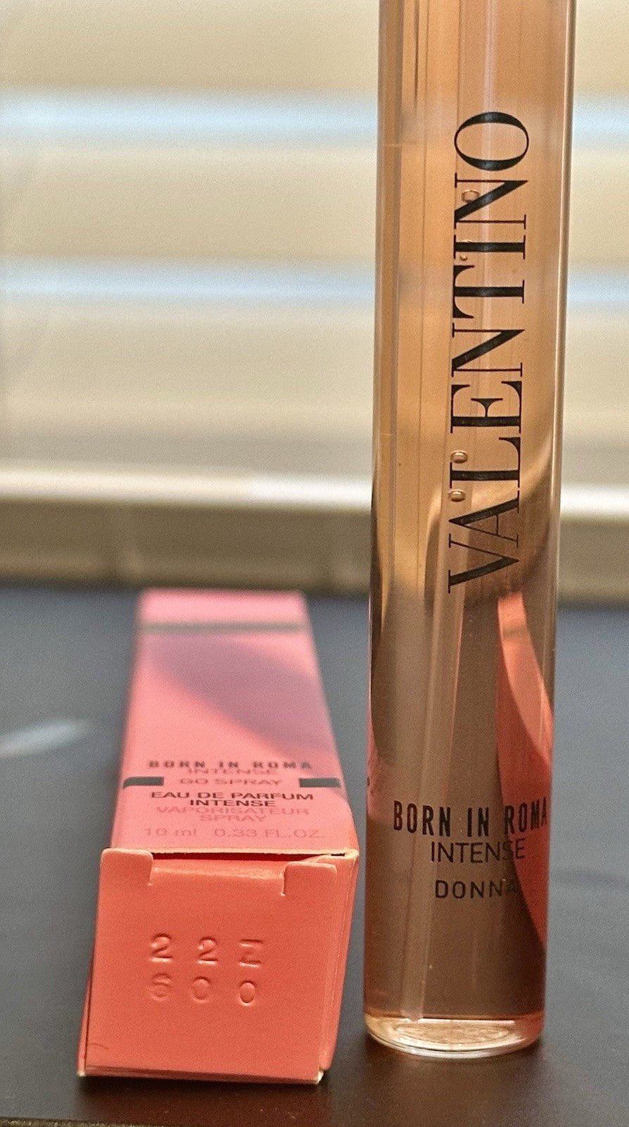 Valentino Donna Born in Roma Intense Go Spray bottle beside box