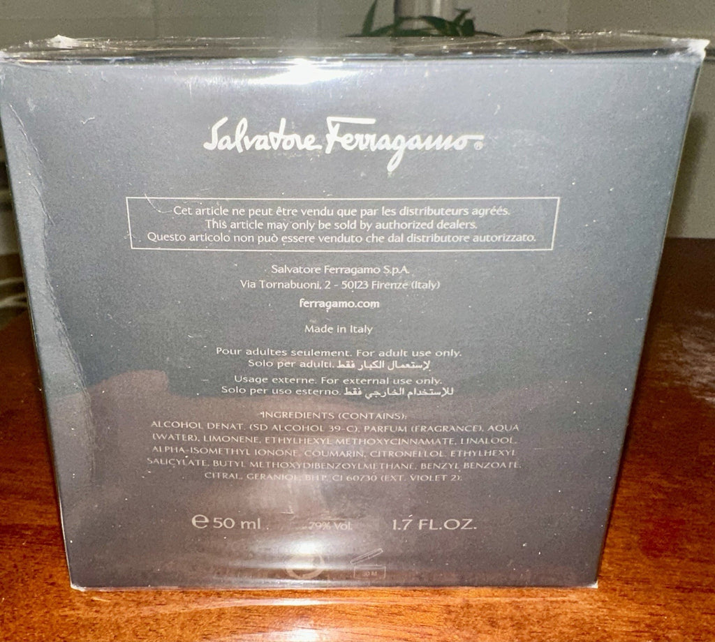 F by Ferragamo Pour Homme Black box on wood surface